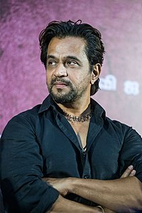 Arjun at the ‘Kolaigaran’ Press Meet.jpg